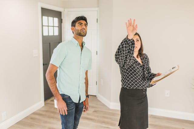 Property manager conducting inspection with tenant